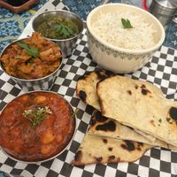 Vegan thali with baigan bharta, chaana masala, y saag aloo  at Red Indian Chilli in Oaxaca