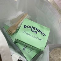 Individual boxes to keep the doughnuts safe! at Doughnut Time - Leicester Square in London