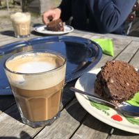 Oat milk cappuccino and vegan chocolate nut cake   at Wildmut in Bad Belzig