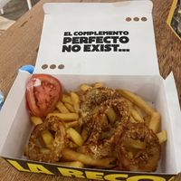 Chips and onion rings, also had mayo  at La ReContra in Lima