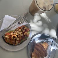 Avocado toast, croissant & iced coffee with cashew milk   at Barro Café in Buenos Aires