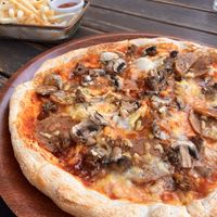 Chips and ‘meat’ lovers pizza   at Burdekin Hotel in Darlinghurst