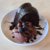 Chocolate Cake served with Chocolate Ganache 😍 at Cafe Mosaics in Edmonton
