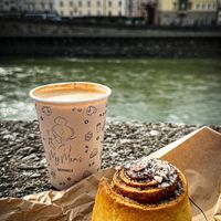 Flat white & cinnamon roll    at My Mom's in Salzburg