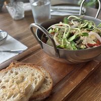 Ok shakshuka with not enough toast    at Earth House Restaurant And Wine Bar in Bangkok