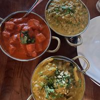 (Left) Tofu masala, (top) veggie korma, (bottom right) baingan bharta   at Tikka & Grill in Denver