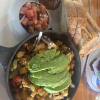 Vegan Tempeh Skillet with sourdough bread and curry-ketchupp  at Amsterdam Restaurant in Kamloops