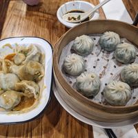 Boiled dumplings with peanut butter and chilli oil sauce/steamed long bao at Shanghai Street - 小籠館 in Melbourne