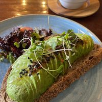 Latte with soy milk and mushroom and avo toast   at Cappuccino Cafe in Cusco