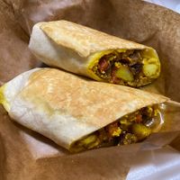 Plant-based burrito with tofu scramble, onions, potato, vegan sausage and cheese. Delicious !  at CW Willis Family Farms in Vero Beach