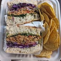 Truffle lobsta on rosemary focaccia with chips and queso at Royal Health World Retail & Cafe in Atlanta