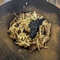 Mushroom risotto with vegan cheese   at Grey in Vilnius