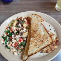 Tofu scramble with spinach, peppers and mushrooms at Snooze in San Diego
