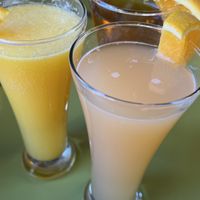 Mimosas with Orange, Grapefruit & Apple Juices  at Snooze in San Diego