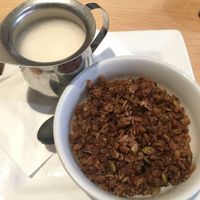 Vegan coconut cranberry baked oatmeal with steamed oat milk  at Prince Street Cafe in Lancaster