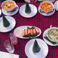 Table full o' curries at KoDam Kitchen in Ao Nang