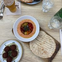 vegan tomato hummus & tomato falafel.. stunning place, 1000s of plants, like an urban garden 🪴  at Twentysix in Budapest