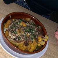 Mezze: Moroccan roasted cauliflower, preserved lemon and parsley tahini, salted chocolate granola, grape leaves  at Twentysix in Budapest