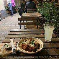 Tables and food   at Hummus Bar - Nagymező utca in Budapest