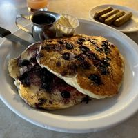 blueberry pancakes and a side of vegan sausages.  at Paradox Cafe in Portland