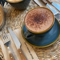 Hot chocolate and oat latte    at Açaï & You - Rue Dauphine in Paris