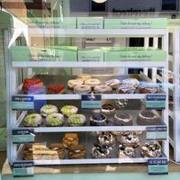 The vegan half of the display case  at Doughnut Time in Wokingham