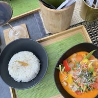 Red Curry with Coconut Milk! So delicious and pretty. You can’t go wrong! They made my husband a Vegan Green Coconut Curry.   at Angkoon in Klagenfurt