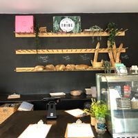 pay counter with fresh bread for purchase at Tribe in Providenciales