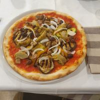vegan Pizza with mushrooms, onions, artichokes, eggplants and olives at Trattoria Pizzeria Le Due Lune in Levanto