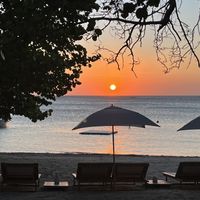 At sunset they rang a bell and gave everyone a champagne toast when the sun slipped into the water   at Luna Muna at Ibagari in Roatan