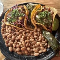 Theee tacos: Cauliflower Al Pastor, Mushroom Chimichurri, and the jackfruit taco with double beans    at Penelope's Vegan Taqueria in Chicago