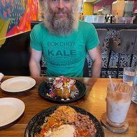 Chimichanga (back) and enchilada + classic horchata (front) at Penelope's Vegan Taqueria in Chicago