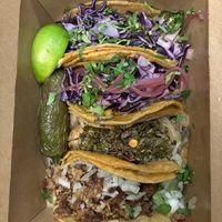 From top, cauliflower al pastor,baja, chimichurri mushroom and asada tacos  at Penelope's Vegan Taqueria in Chicago