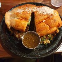 Bread with potatoes, Avocado, chorizo and veggies at Penelope's Vegan Taqueria in Chicago