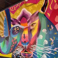 Funky murals on the walls inside at Penelope's Vegan Taqueria in Chicago