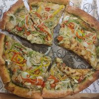 This pizza is massive and delicious! at Seven Bridges in Hanoi