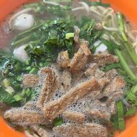Crispy ‘pork belly’ noodle soup before adding the home made chilli sauce  at Reunion Cafe in Vientiane