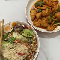 (Those “eggs” are vegan substitutes not real egg!) spicy mixed salad and tofu …leaf dish!   at Reunion Cafe in Vientiane