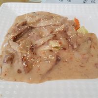 Fried 'duck' with peanut sauce at Reunion Cafe in Vientiane