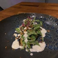 “Eggplant emoji” dish. Smoked eggplant with a cashew cream dressing   at Foxtrot Bistro in Koh Samui