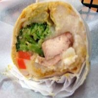 Big Bali wrap - Tofu, mashed potatoes, steamed veggies, curry sauce in a spinach wrap. at Wrap Planet in Winter Park