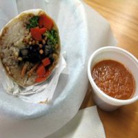 Chow Mommy wrap - tofu, white rice, black beans, steamed veggies, teriyaki sauce with crispy noodles in a flour wrap.  Habenero hot sauce on the side. at Wrap Planet in Winter Park