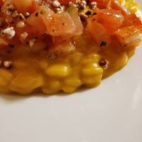 Risotto with carrot cream, smoked tomatos and buckweat popcorn at Mutty in Castiglione Delle Stiviere