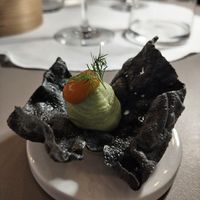 Entrée edamame, candy apricot and black carbon chip at Mutty in Castiglione Delle Stiviere