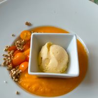 Gaspacho de courge, lait de coco, citron vert-kumquat confits-sarrasin caramélisé-glace maison à la mandarine at Les Herbes Folles in Douarnenez