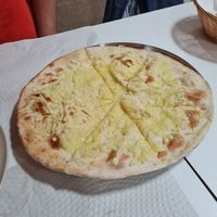 Garlic pizza bread which isn't on the menu but they were happy to make it for us as they have vegan cheese at Mani's in Faro