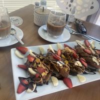 Quinoa waffle, iced coffee with soy milk  at Canttú in Huaraz