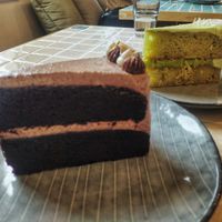Belgian chocolate cake was not interesting. The green cake was nice. at The Vegan Place in Kuala Lumpur
