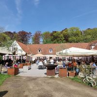 Large outdoor seating at Urban Café in Beernem