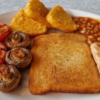 (Vegan) all in breakfast. I paid for the extra hashbrown as they wouldn't swap it in despite removing the bacon and eggs at Joyland American Family Diner in Great Yarmouth